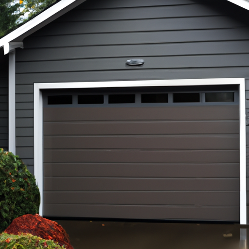 Exterior view of an insulated sectional garage door on a Bothell home on an overcast day, showing panels and weather seal.