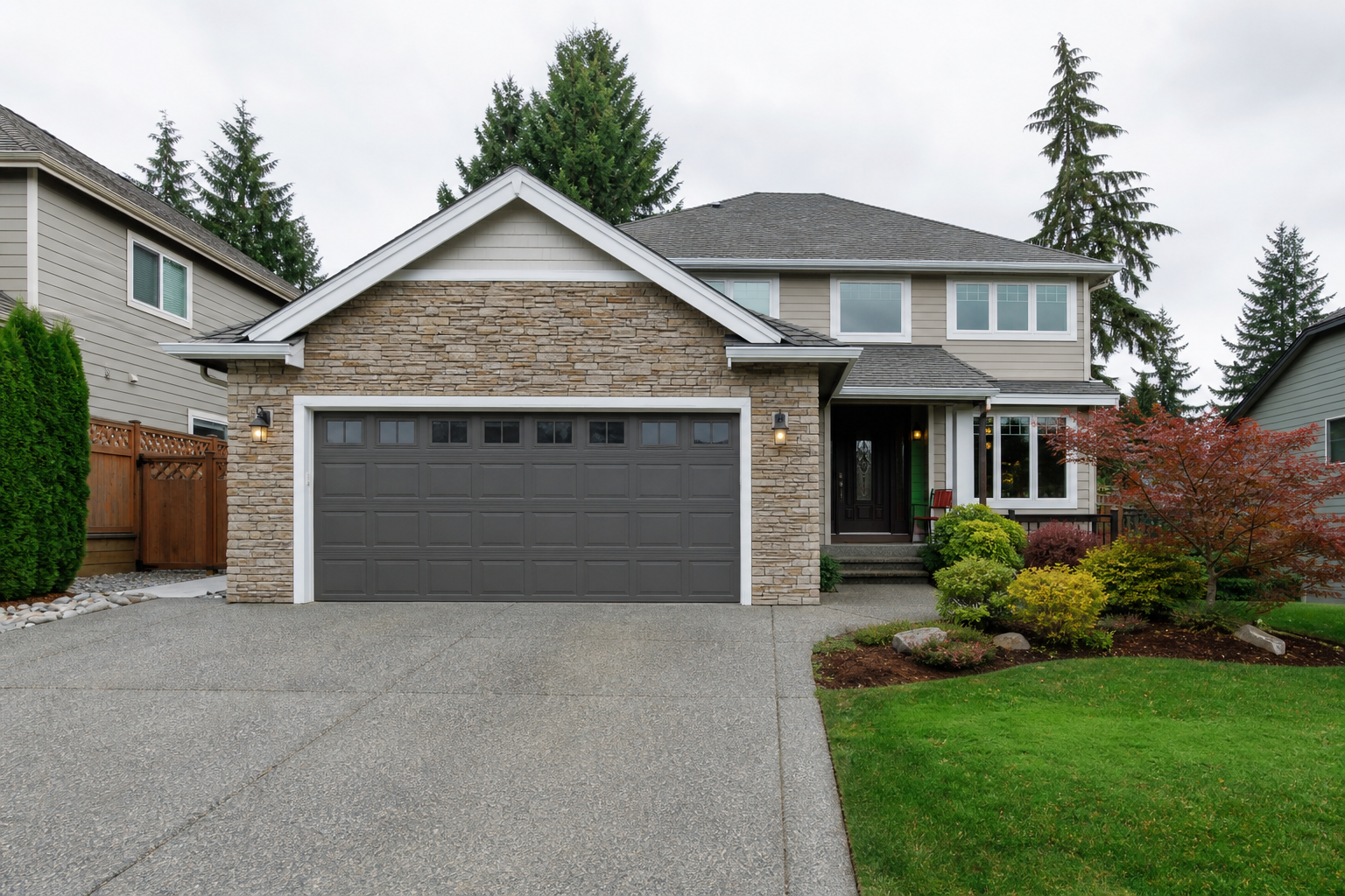 Bothell home exterior with a visible garage door on a cloudy Northwest day